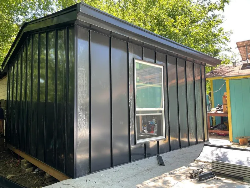 Black standing seam metal wall panels for Roof Inspection in East Flat Rock