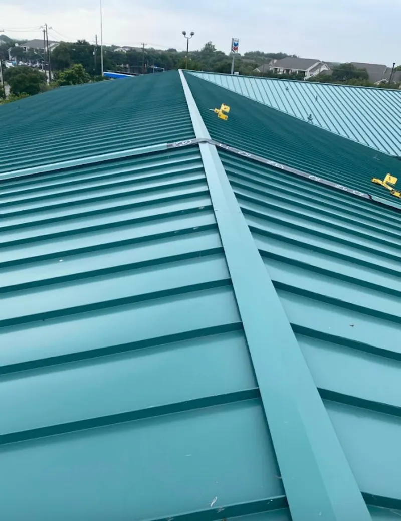 Green commercial metal roof ridge and valley for Metal Roof Repair in East Flat Rock