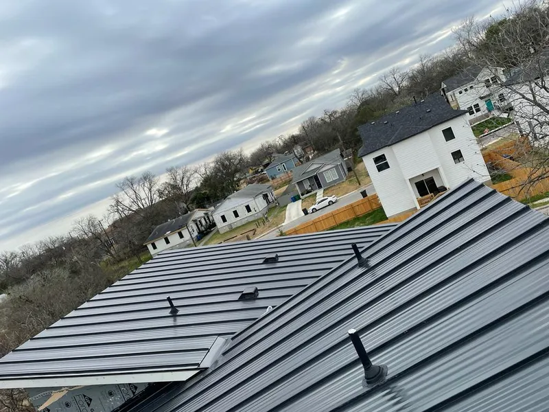 Standing seam metal roof panels with vents for Skylight Repair in East Flat Rock